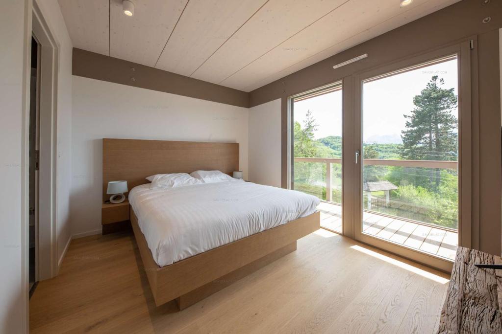 Posteľ alebo postele v izbe v ubytovaní Appartement UBAC