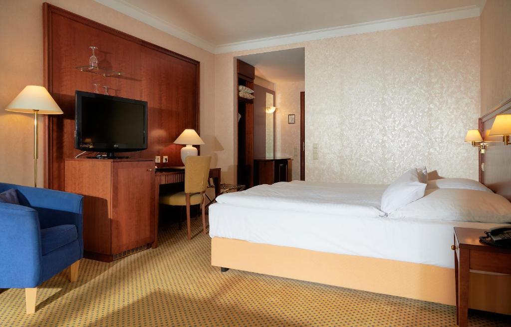 Postel nebo postele na pokoji v ubytování Grand Hotel Binz