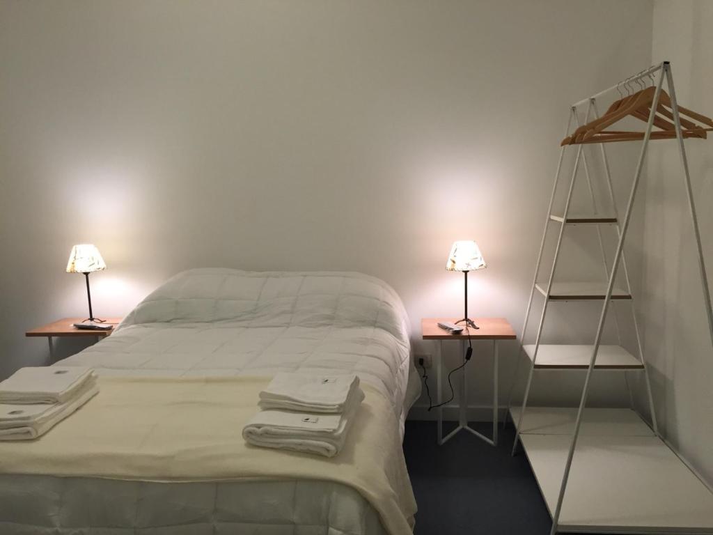 Кровать или кровати в номере Ukurj Apartamentos
