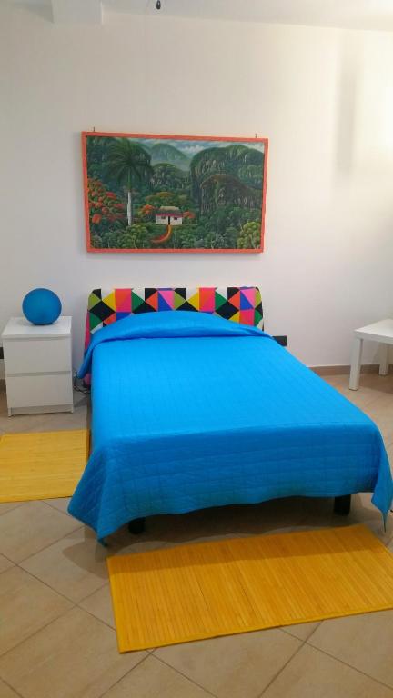 Postel nebo postele na pokoji v ubytování Tortugas B&B