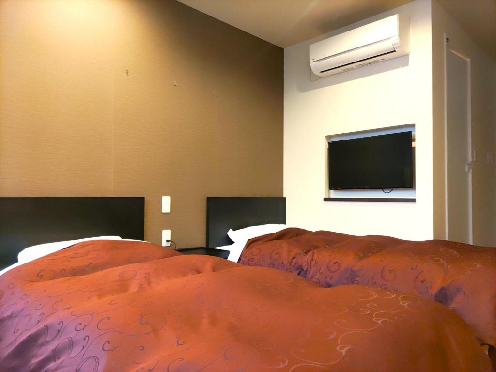 TV a/nebo společenská místnost v ubytování PREMIUM TOJI
