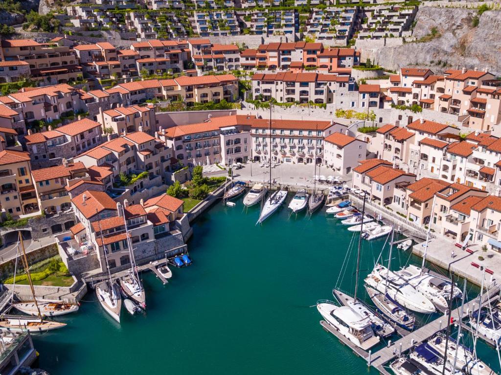 an aerial view of a harbor with boats docked at Portopiccolo Apartments - Zaffiro nel Borgo in Sistiana