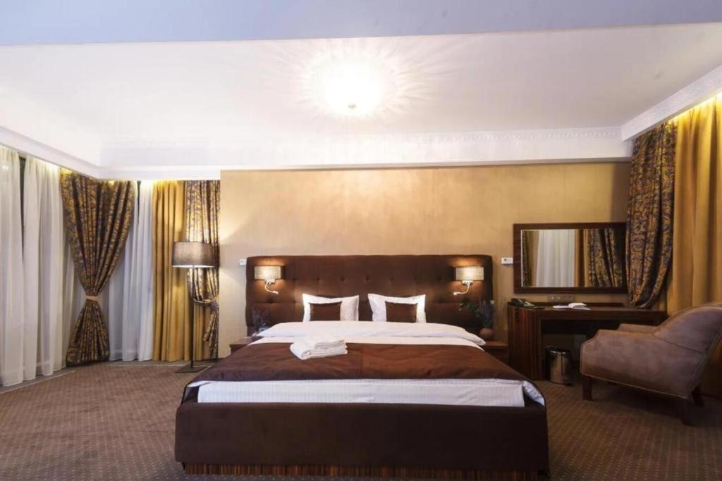 Postel nebo postele na pokoji v ubytování Time Hotel&SPA