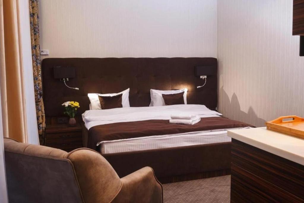 Postel nebo postele na pokoji v ubytování Time Hotel&SPA