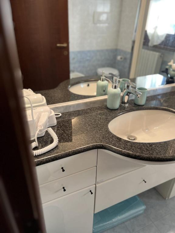 Kuchyň nebo kuchyňský kout v ubytování Rilo's Home