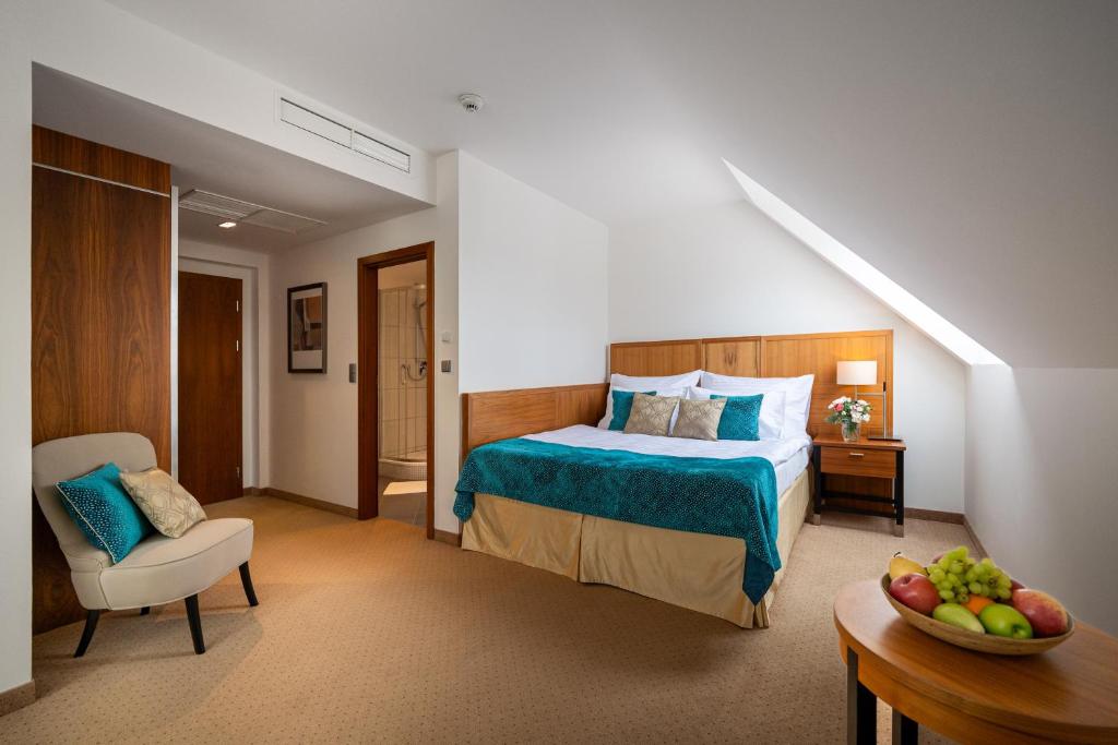 Postel nebo postele na pokoji v ubytování Hotel Silenzio