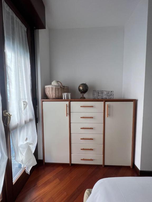 Postel nebo postele na pokoji v ubytování Rilo's Home