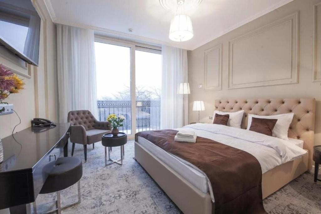 Postel nebo postele na pokoji v ubytování Time Hotel&SPA