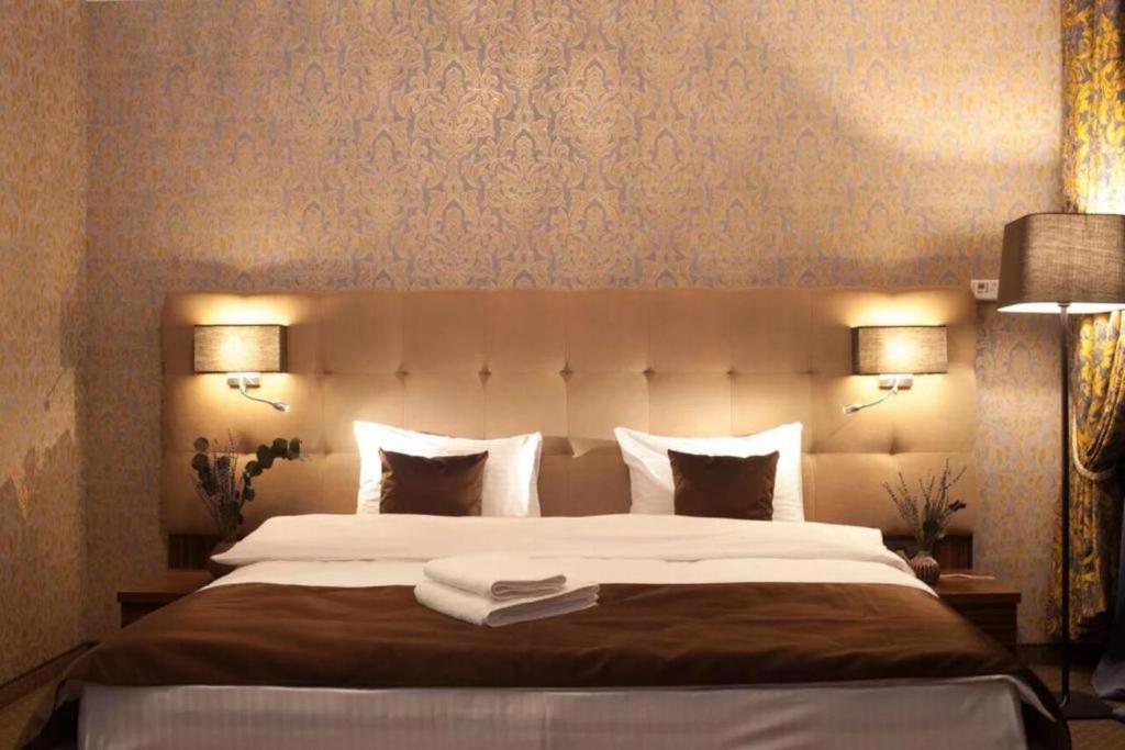 Postel nebo postele na pokoji v ubytování Time Hotel&SPA