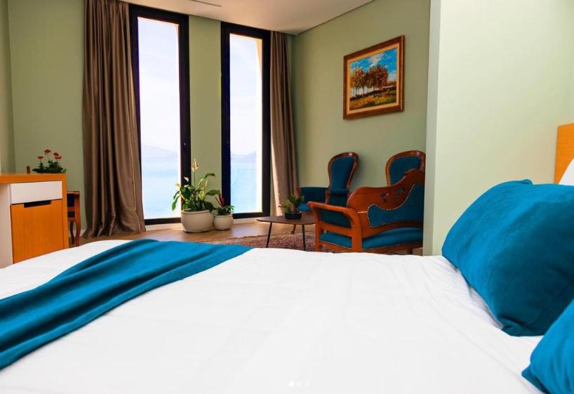 Postel nebo postele na pokoji v ubytování Hotel Bologna