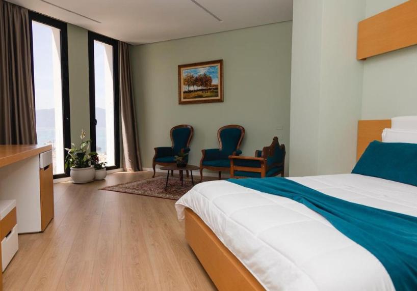 Postel nebo postele na pokoji v ubytování Hotel Bologna