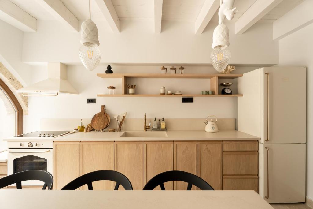 Kuchyň nebo kuchyňský kout v ubytování Cortiletto Timeless Suites