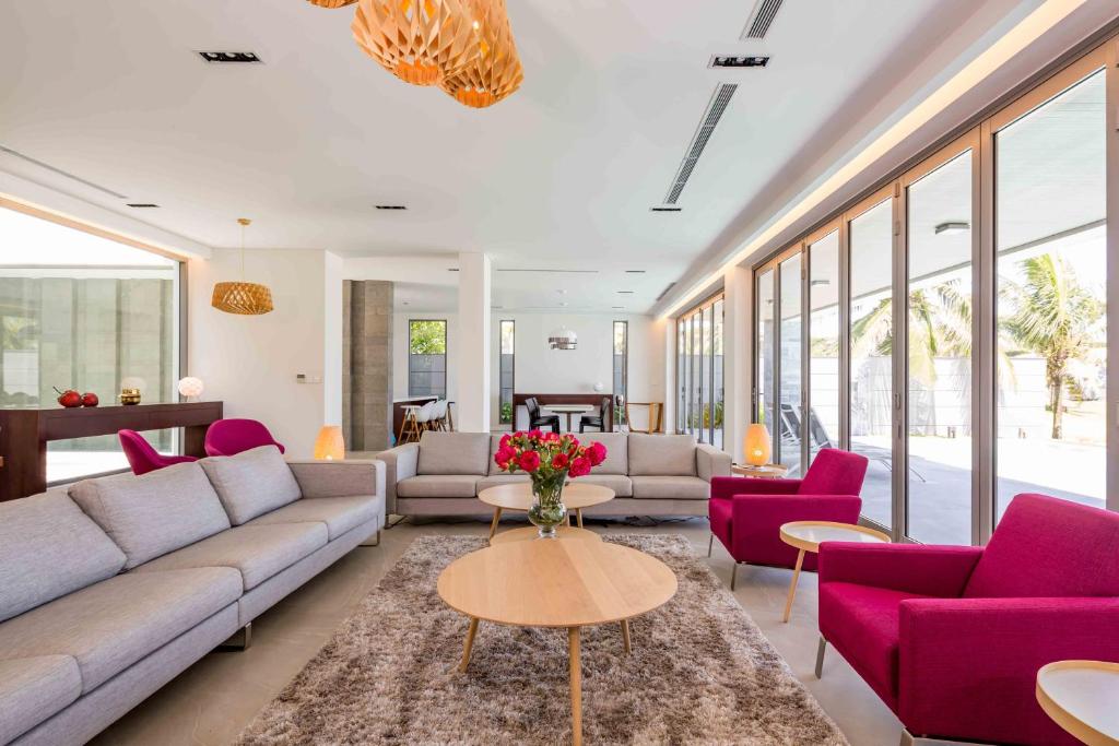 Posezení v ubytování Deluxe Beachside Resort Danang
