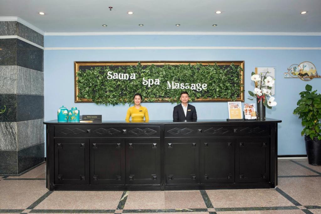 A formal reception desk for the hotel’s sauna and massage services.