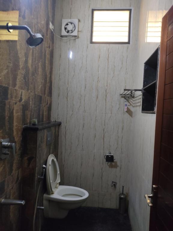 Koupelna v ubytování Iris Comfort Inn