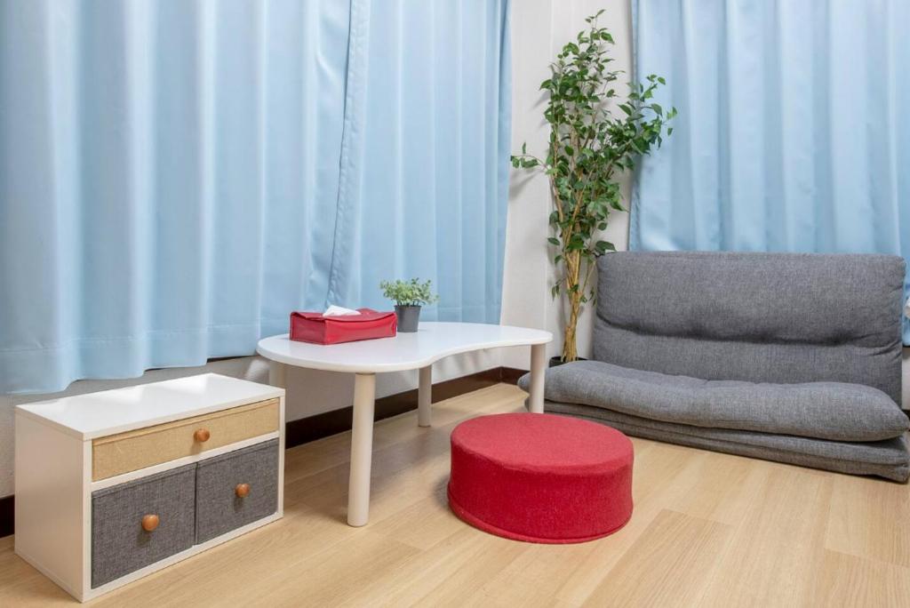 Posezení v ubytování Uhome Tabata Apartment