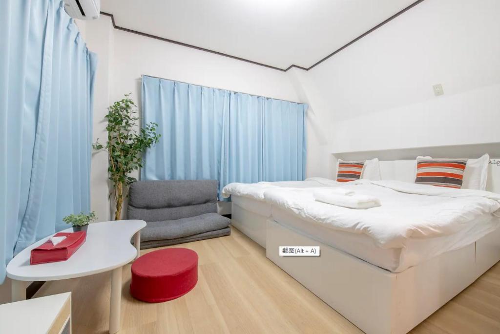 Postel nebo postele na pokoji v ubytování Uhome Tabata Apartment