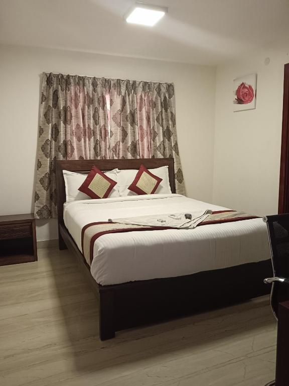 Iris Comfort Inn - Deluxe Double Room (2 Adults + 1 Child)