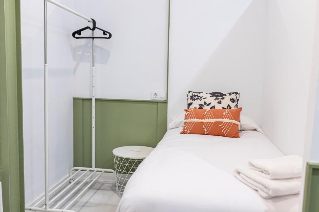 Postel nebo postele na pokoji v ubytování Resolana Suites