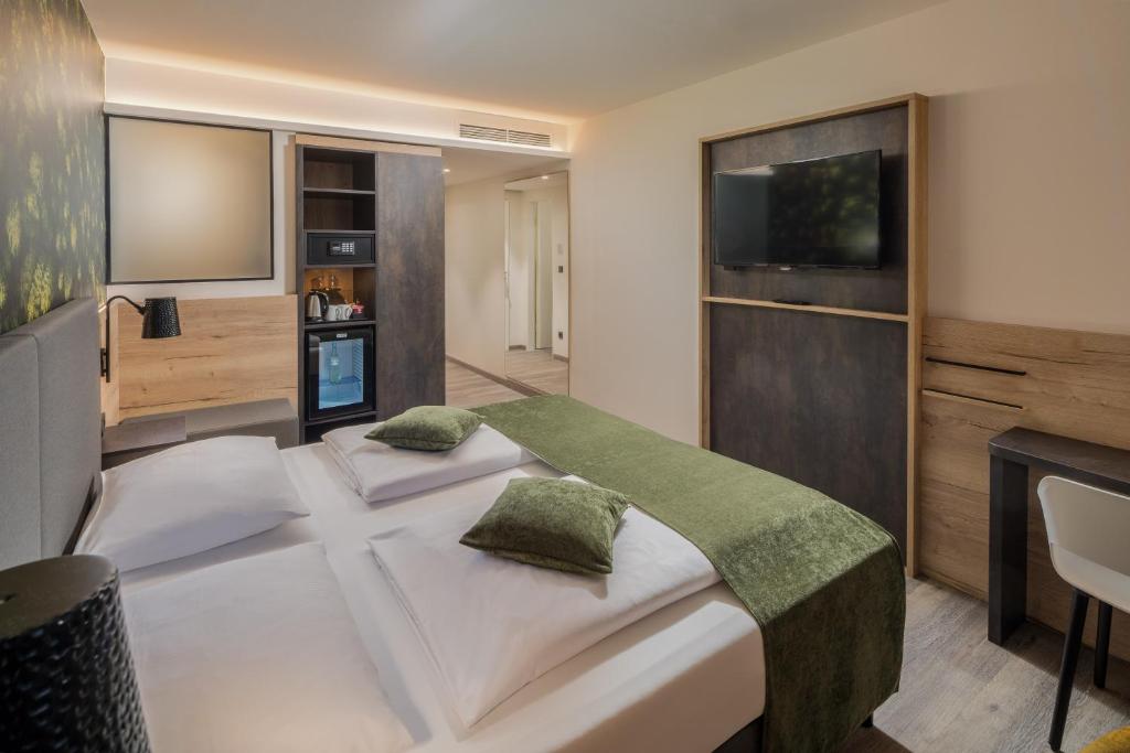 Postel nebo postele na pokoji v ubytování Best Western Hotel München Airport