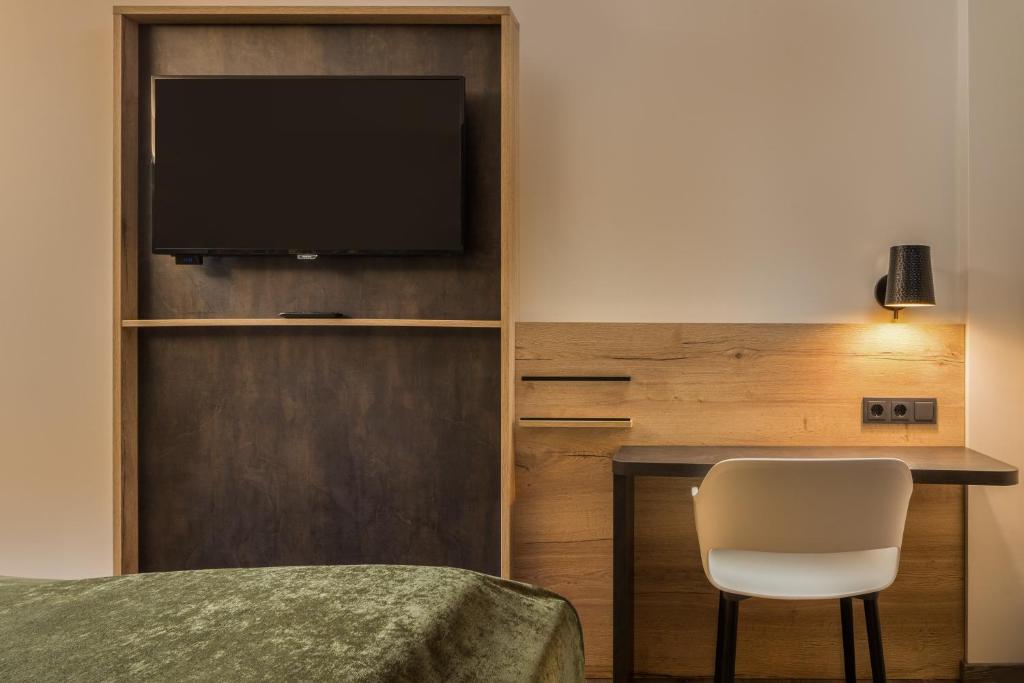 TV a/nebo společenská místnost v ubytování Best Western Hotel München Airport