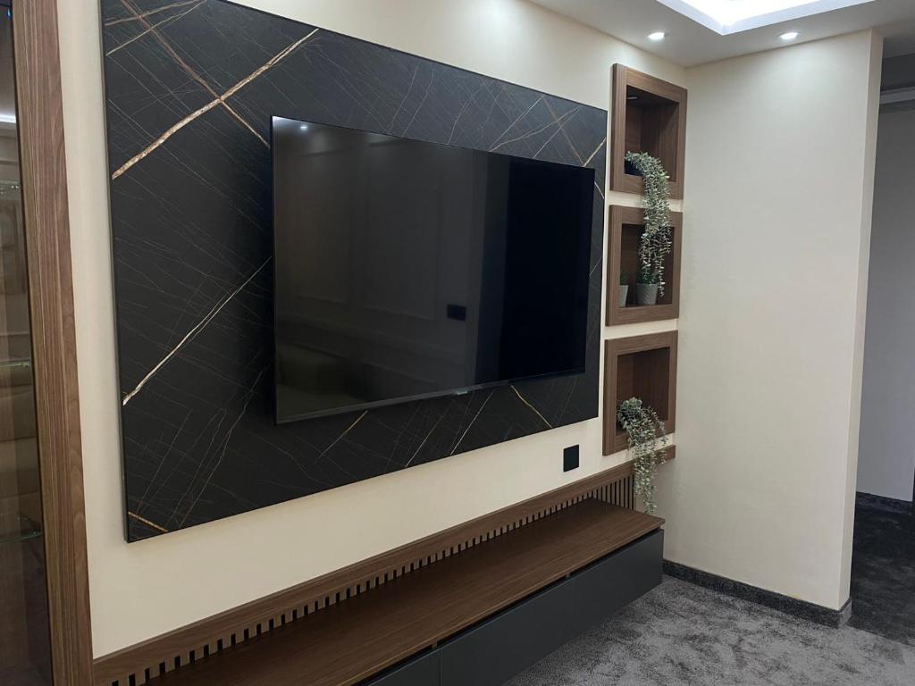 TV a/nebo společenská místnost v ubytování Hotel Stari Krovovi