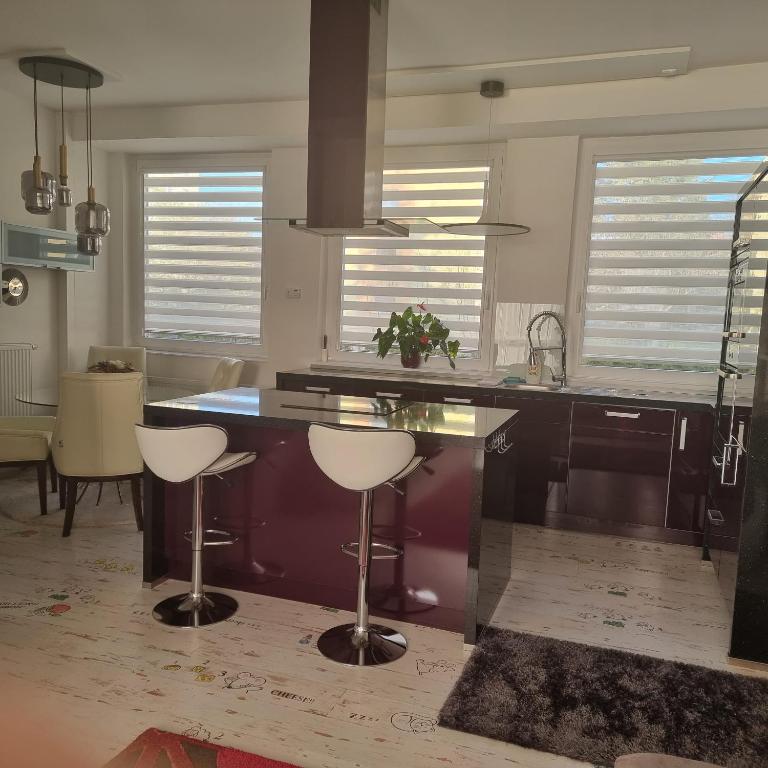 Posezení v ubytování Bordó apartmán A4 v Chomutově