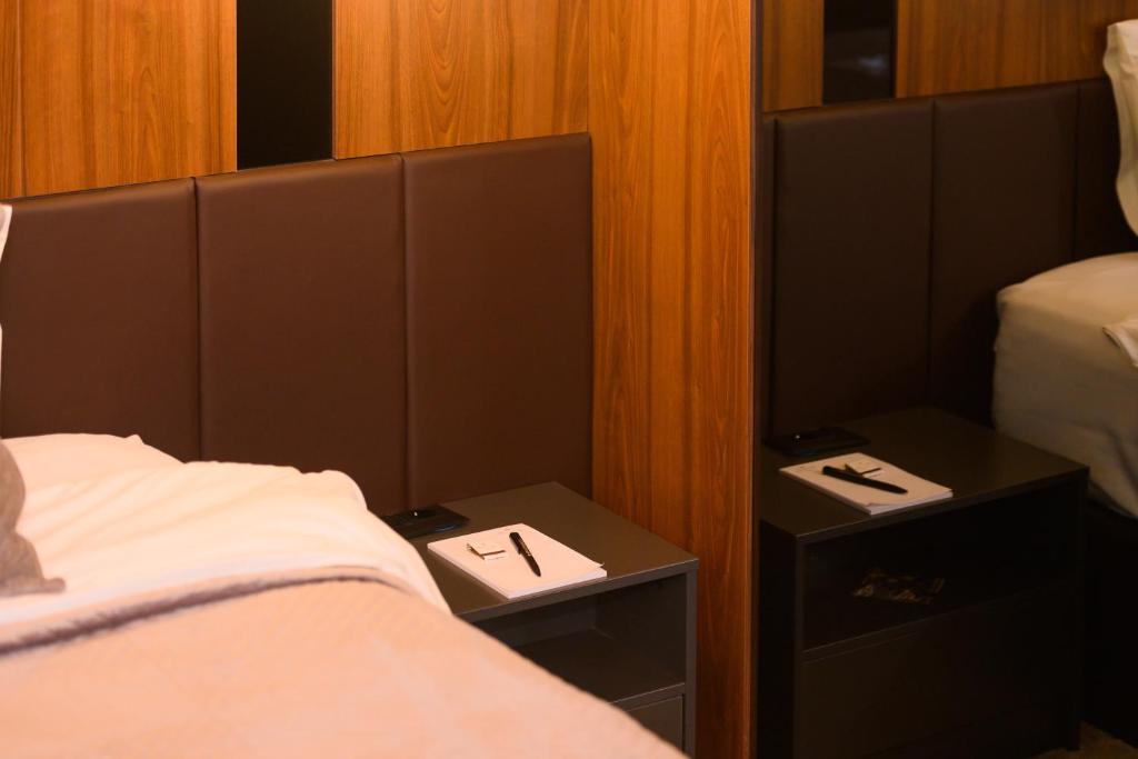 Postel nebo postele na pokoji v ubytování Hotel Macedonia Square