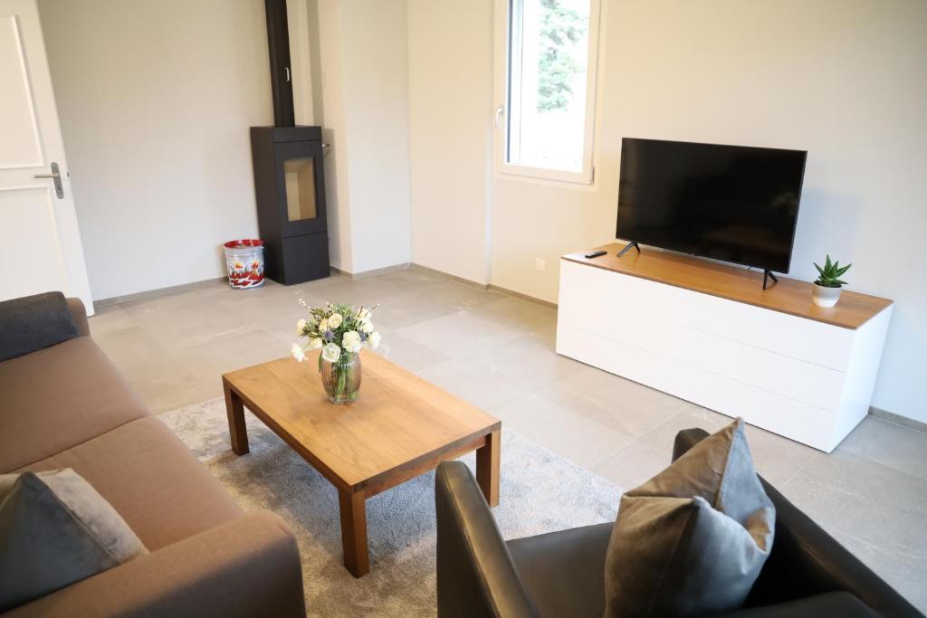 TV a/nebo společenská místnost v ubytování Casa QUATTRO FIUMI
