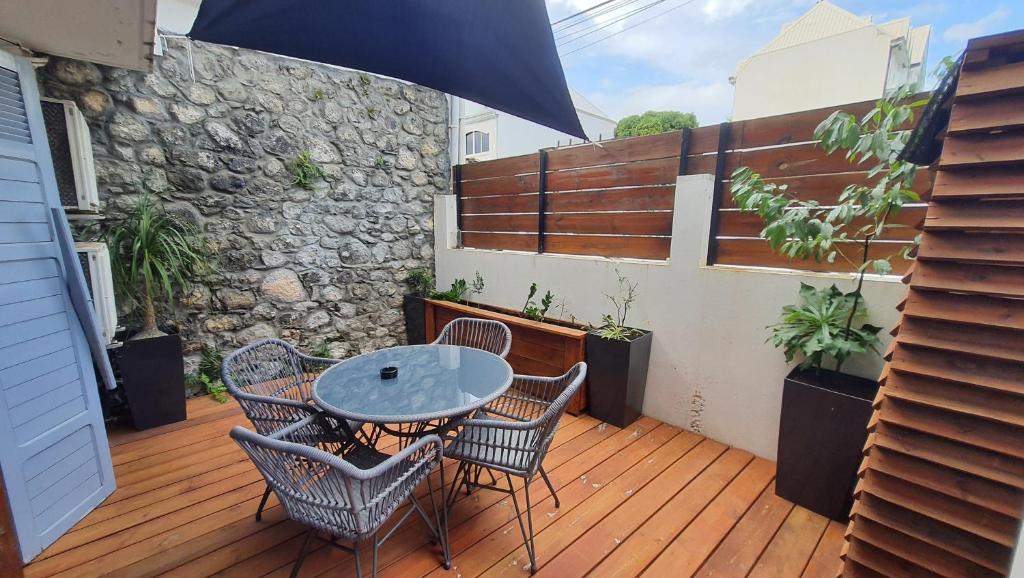 Balkón nebo terasa v ubytování 1A - Chambres et Appartements au calme - Centre St Denis - Barachois