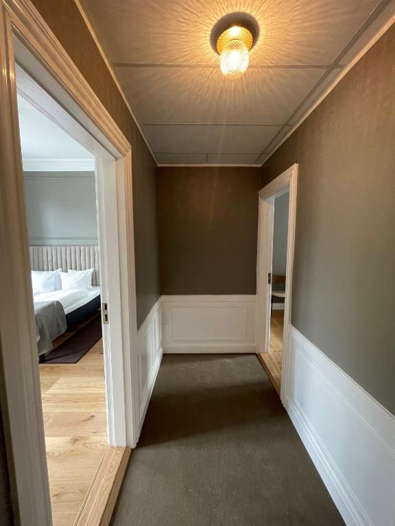 Postel nebo postele na pokoji v ubytování Hotel Sct. Thomas