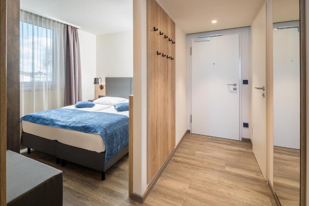 Postel nebo postele na pokoji v ubytování Best Western Hotel München Airport