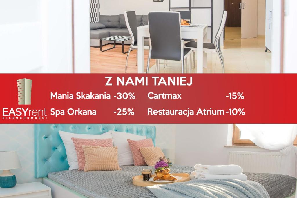 een poster van een kamer met een bed en een tafel bij EASY RENT Apartments - LOFT in Lublin
