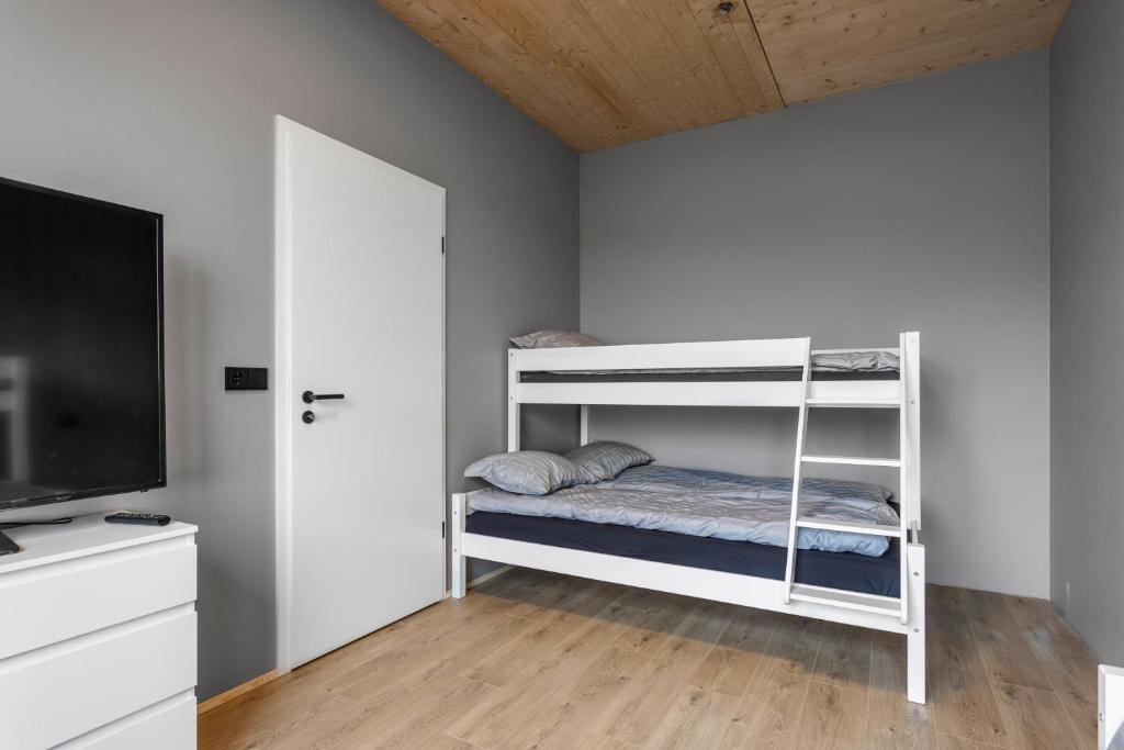 Rúm í herbergi á Luxury Golden Circle Villa