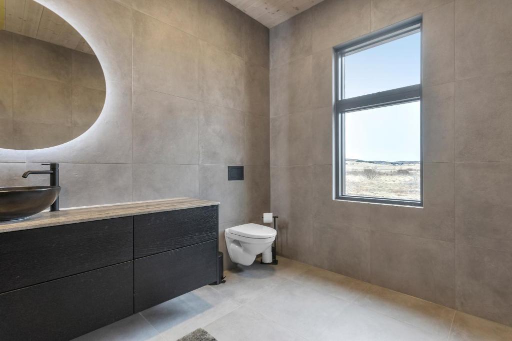 Baðherbergi á Luxury Golden Circle Villa