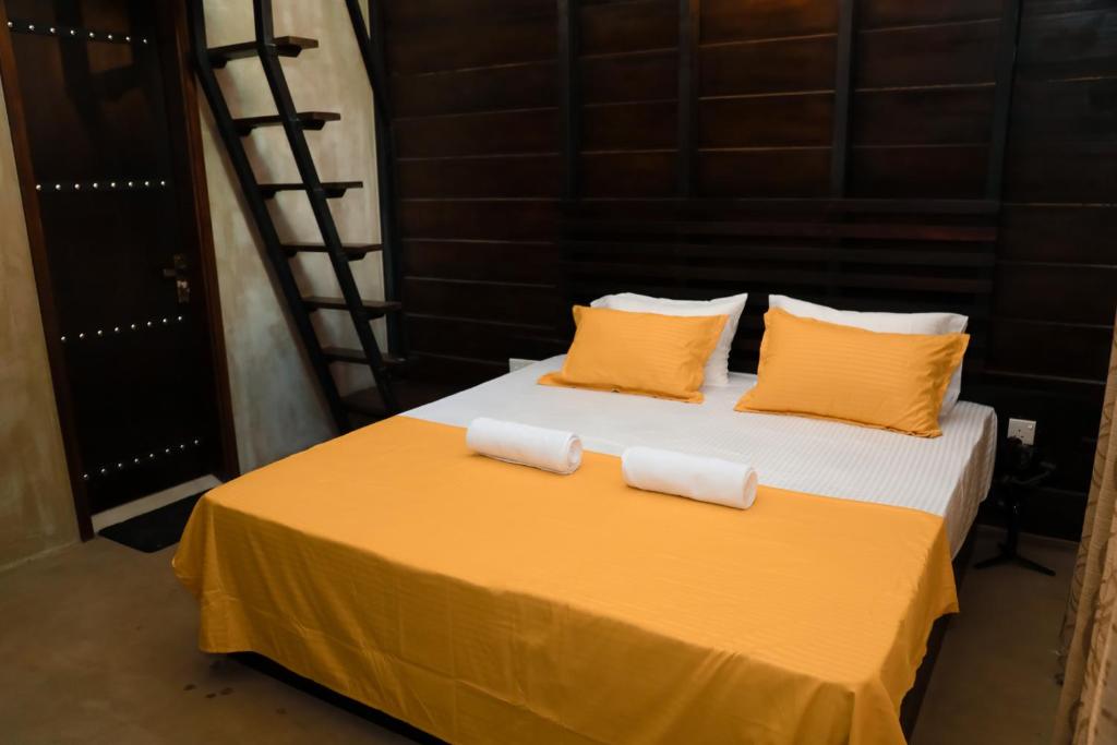 Postel nebo postele na pokoji v ubytování Eco Knuckles Holiday Lodge