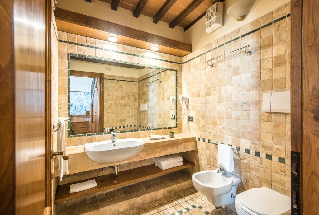 Koupelna v ubytování Hotel Palazzo Squarcialupi