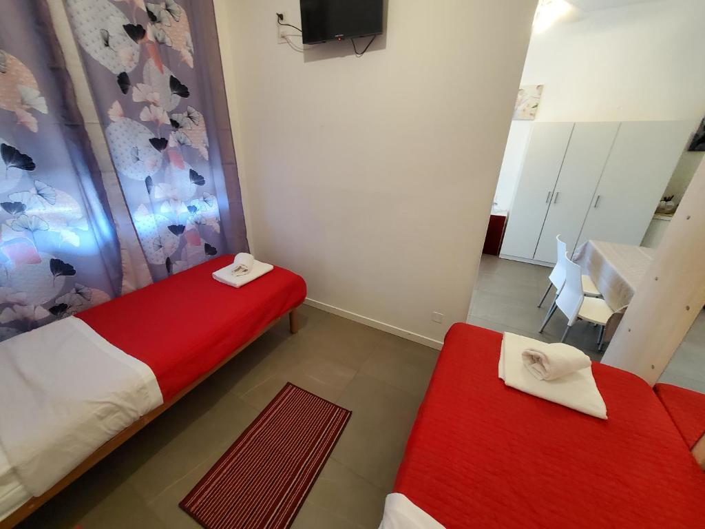 Postel nebo postele na pokoji v ubytování HB Bonomelli 15