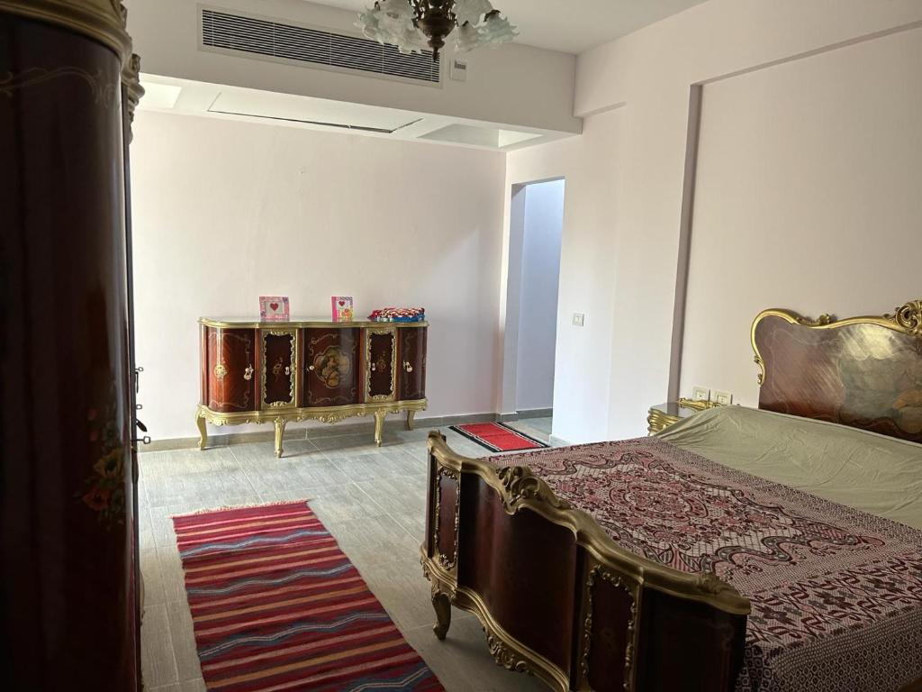Postel nebo postele na pokoji v ubytování North Coast sedra resort Villa, قرية سيدرا الساحل الشمالي