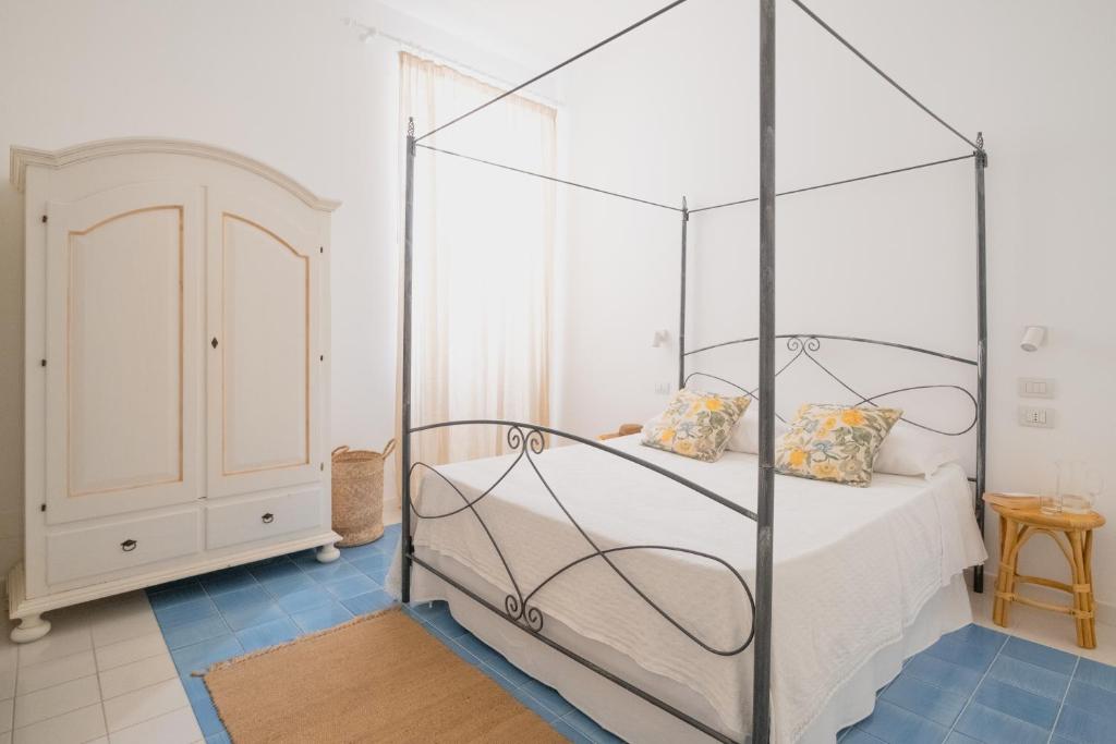 Postel nebo postele na pokoji v ubytování Casa Giulia