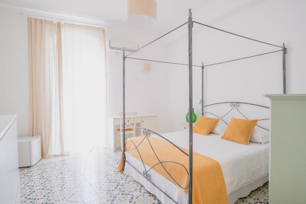 Postel nebo postele na pokoji v ubytování Casa Giulia
