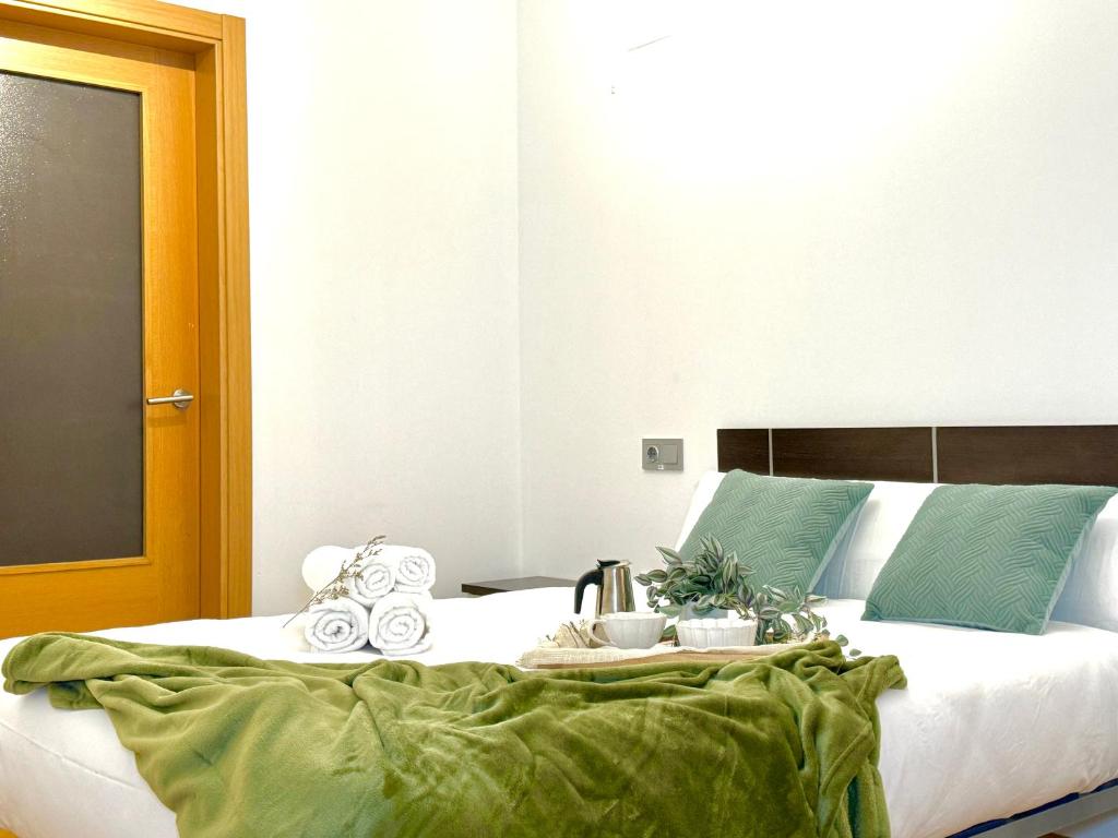 Postel nebo postele na pokoji v ubytování Wave Apartments