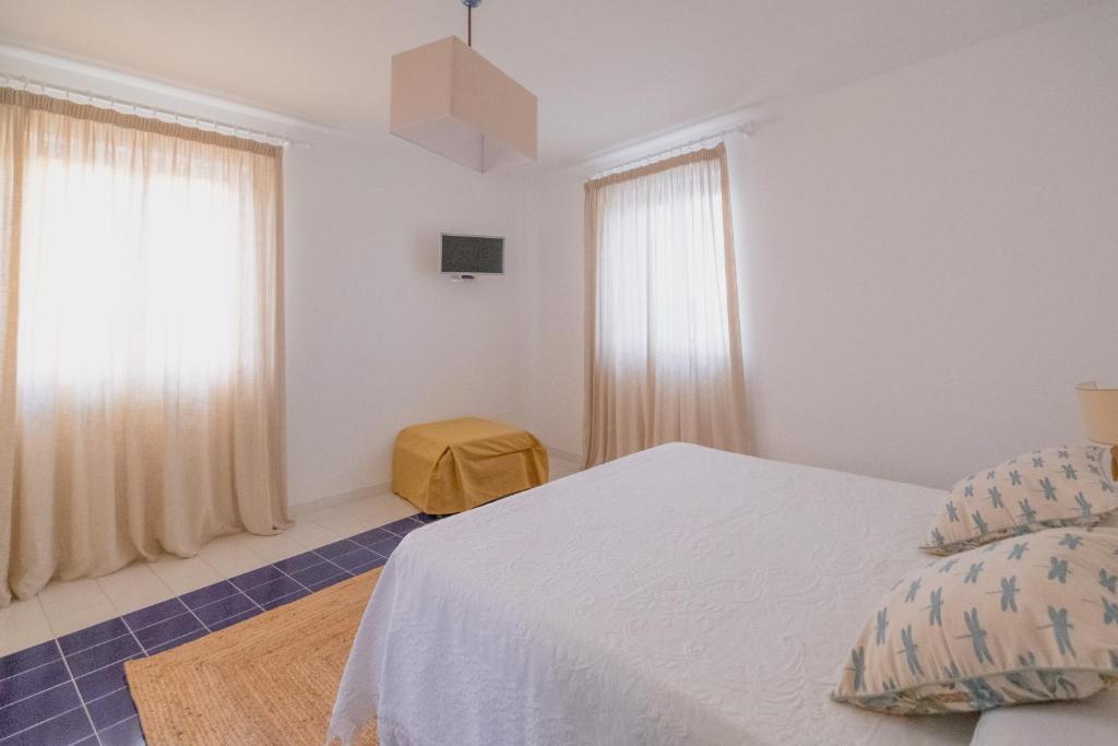 Postel nebo postele na pokoji v ubytování Casa Giulia