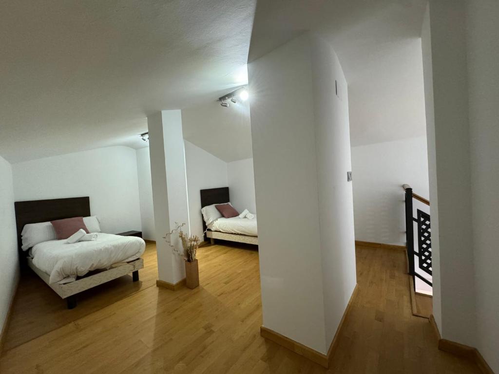 Postel nebo postele na pokoji v ubytování Wave Apartments