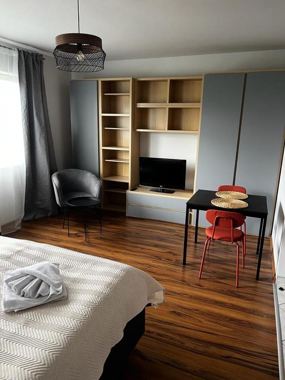 Posteľ alebo postele v izbe v ubytovaní Delta Apart-House