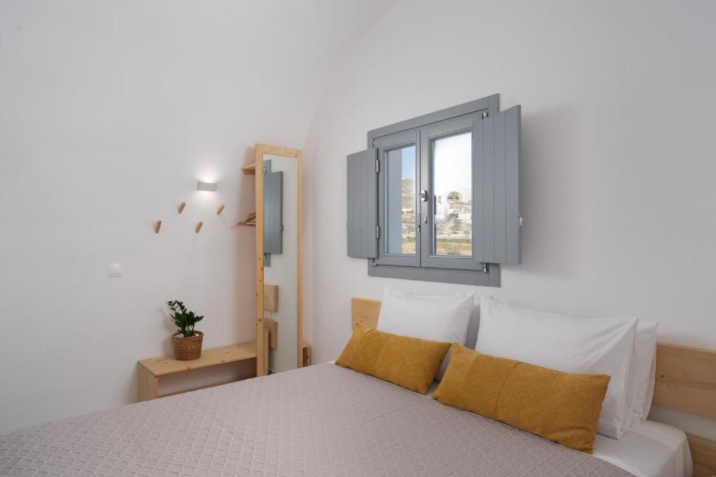 Postel nebo postele na pokoji v ubytování The Vine Suites