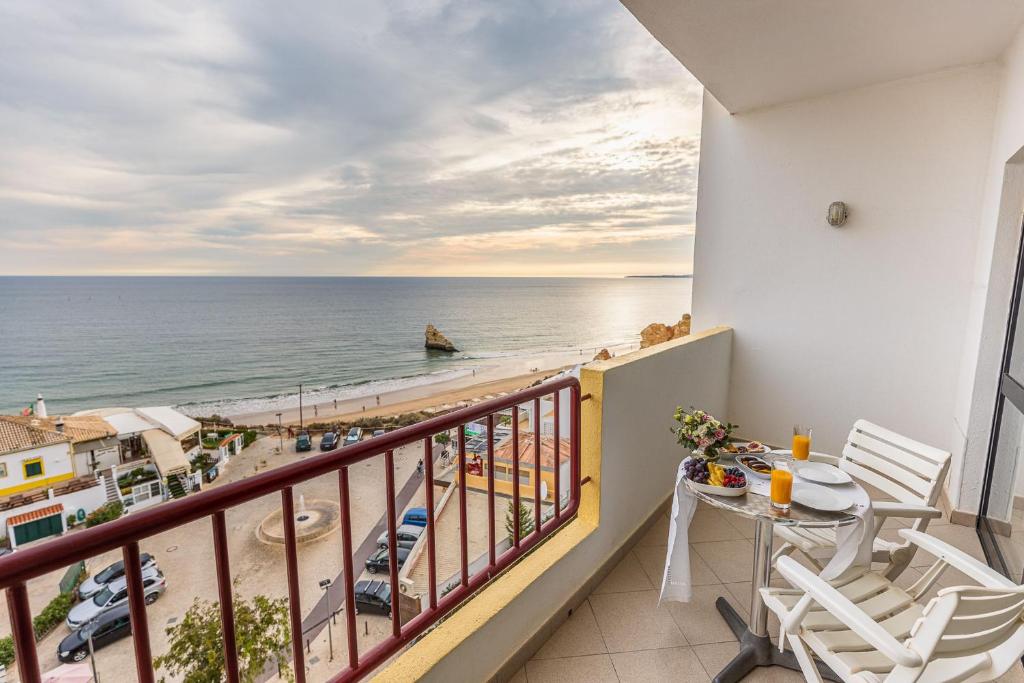 Beachfront 1 BDR Apartment With Pool by LovelyStay