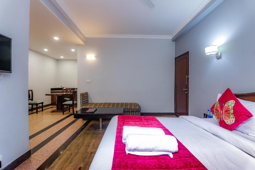 Postel nebo postele na pokoji v ubytování Green N Breeze Resorts Mussoorie