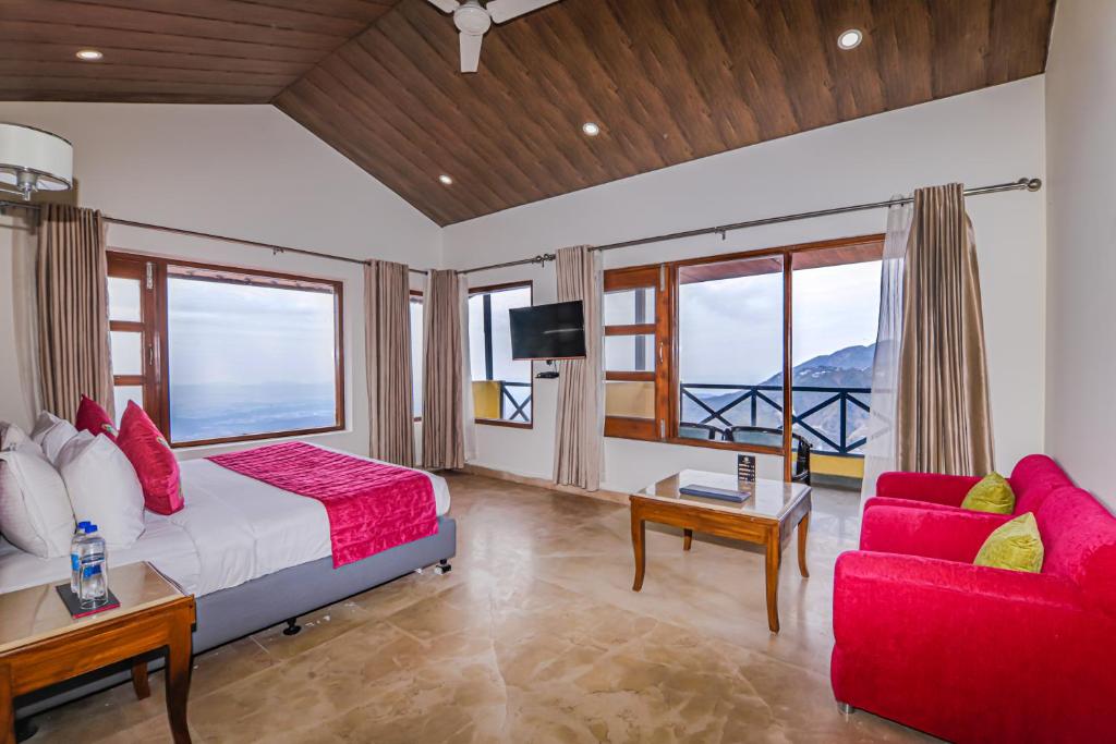 Postel nebo postele na pokoji v ubytování Green N Breeze Resorts Mussoorie