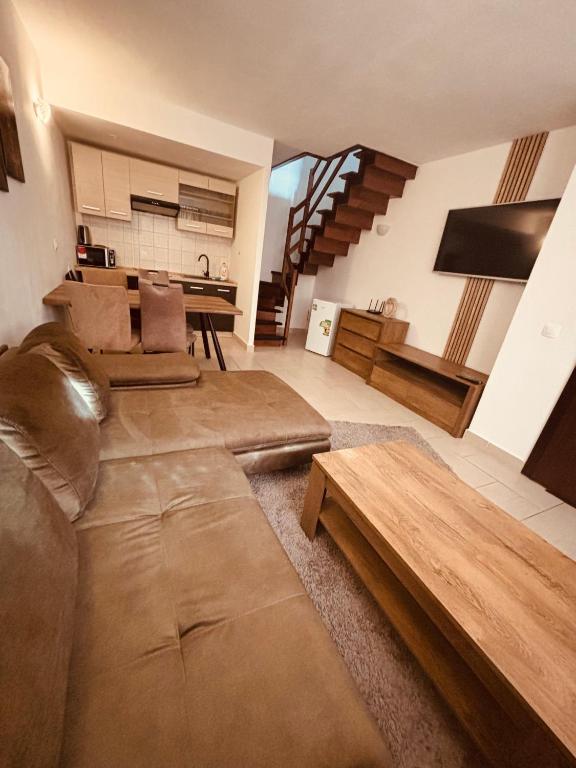 Kuchyň nebo kuchyňský kout v ubytování Apartmány Alexander